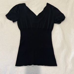 Black Bebe deep V with crisscrossed back shirt, size Medium.